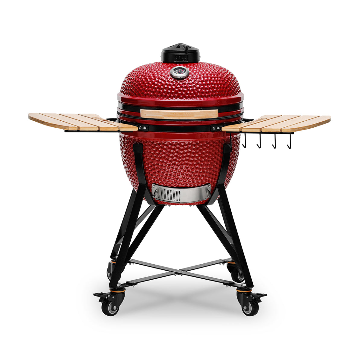Red ceramic barbecue grill with wooden shelves on a white background